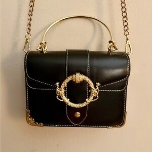 Striking Black and Gold Women's Bag with Chain Strap